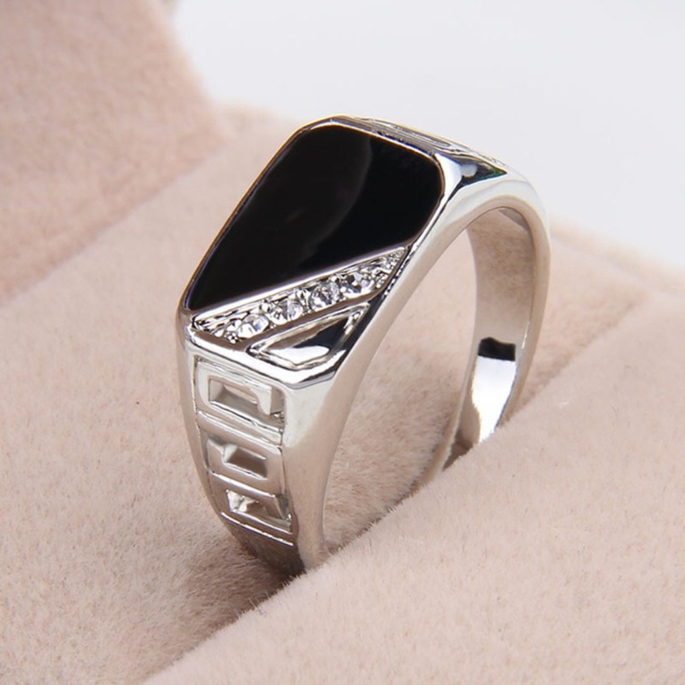 Men’s black and silver ring